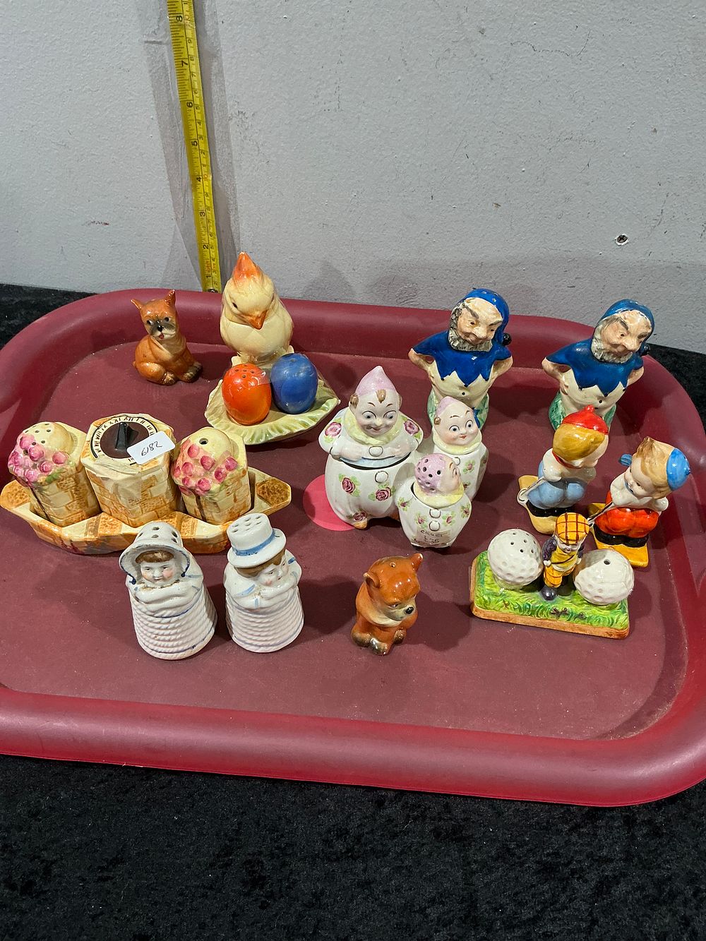 Lot 292: A Collection of Mid-Century Novelty Ceramic Figurines and Condiment Sets including McCoy and Fitz and Floyd Styles
Category: Ceramics