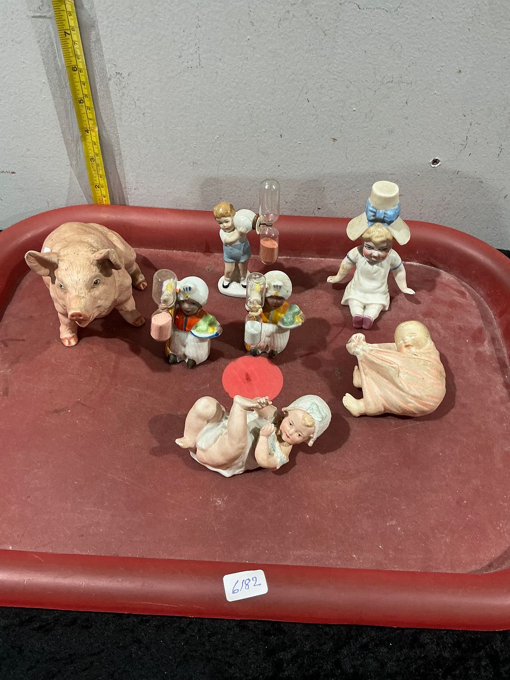 Lot 294: German Style Bisque and Porcelain Figurines, Including Piano Baby and Pig
