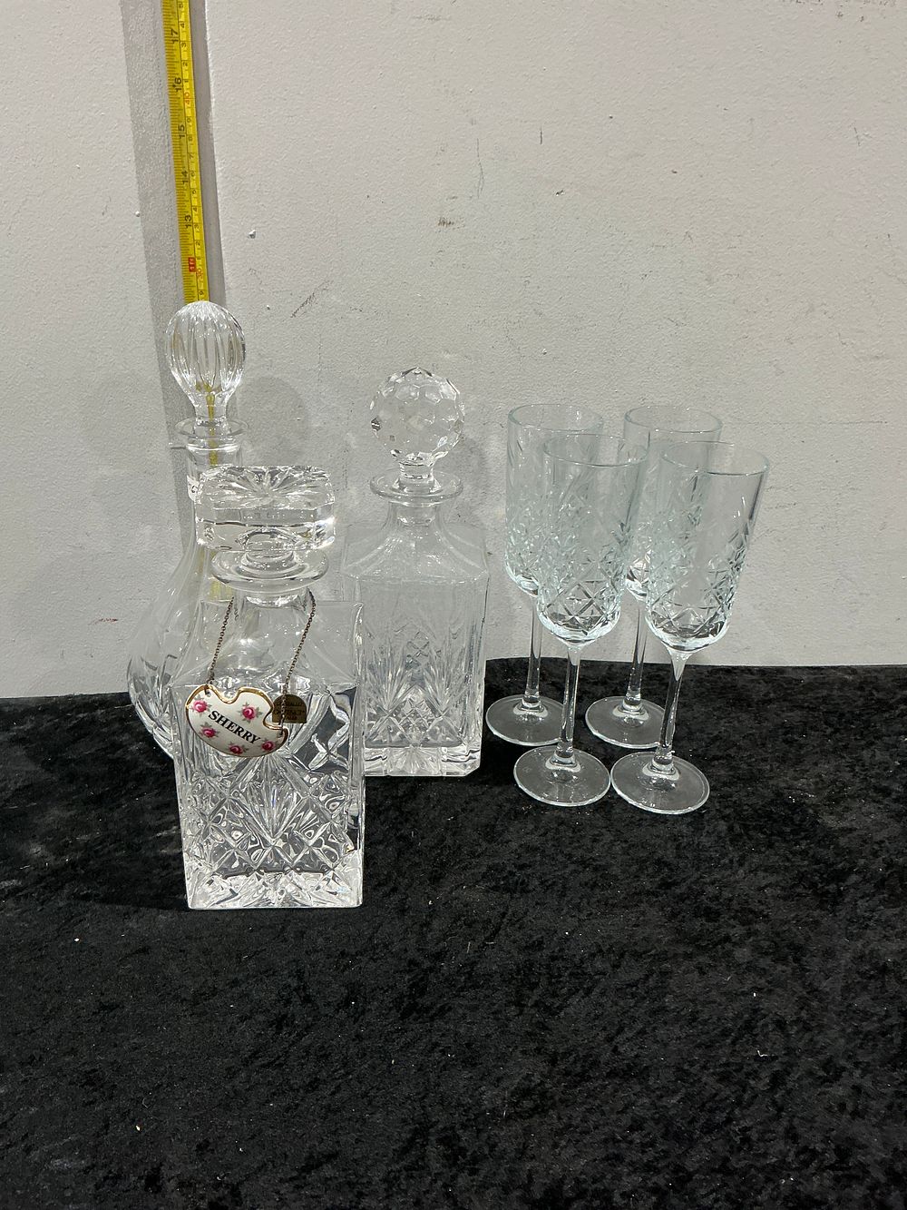 Lot 337: A Collection of Waterford Style Cut Lead Crystal Glassware Including Three Decanters and Four Stemware Glasses
Category: Cut Glass & Crystal