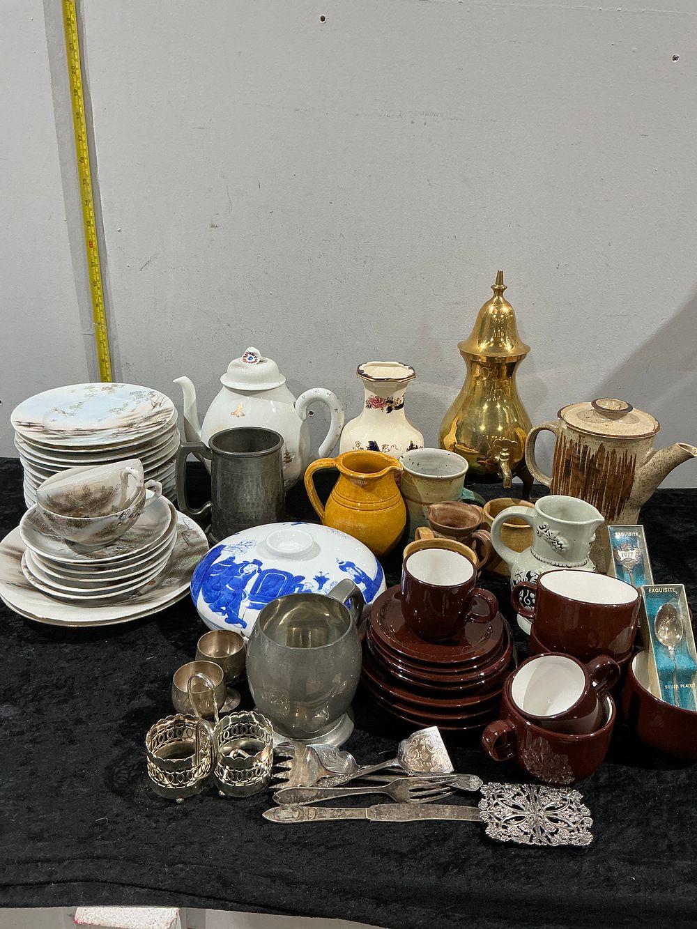 Lot 353: A Comprehensive Collection of Assorted Ceramic Tableware Brassware and Silver-plated Serving Items
Category: Ceramics