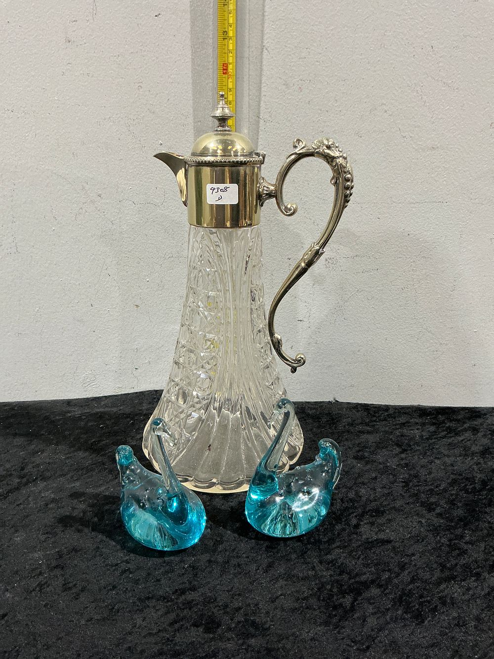 Lot 158: A Victorian Style Cut Glass and Silver-Plated Claret Jug and Two Art Glass Bird Figurines