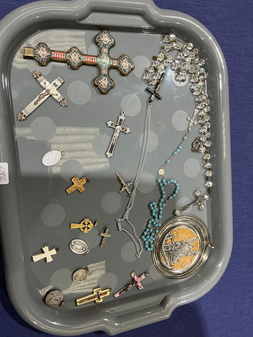 Lot 240: Mixed Metal Tone Religious Jewellery Collection featuring Enamel Crucifix, Rosaries, and Devotional Pendants
