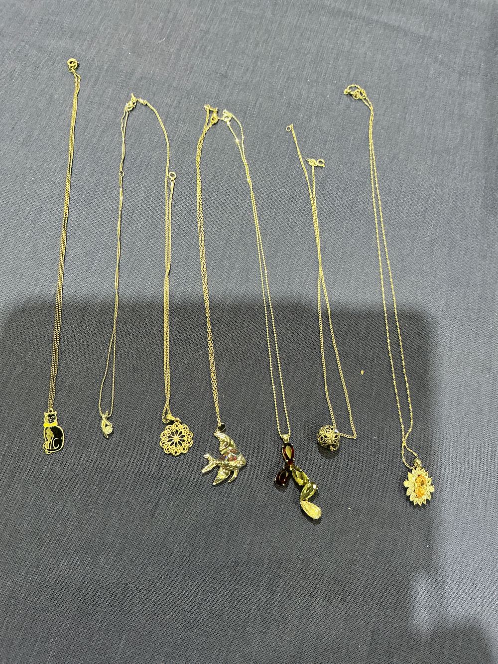Lot 244: Gold-toned, Pendant Necklaces, Mixed Collection of Seven