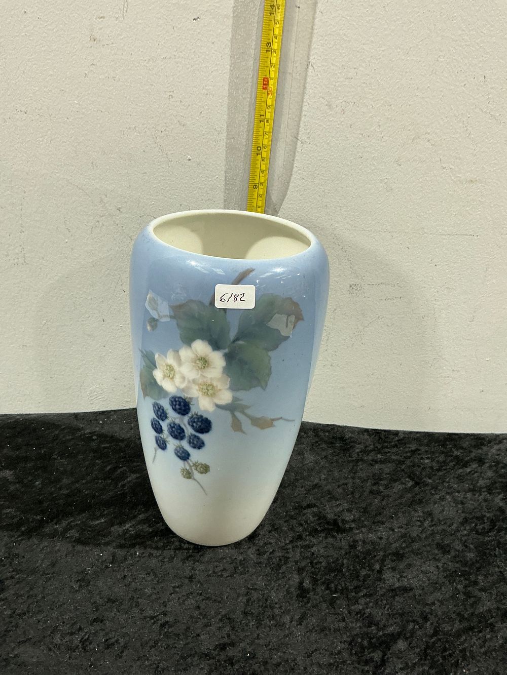 Lot 300: A Royal Copenhagen porcelain vase decorated with blackberries and blossoms, model 288-1049