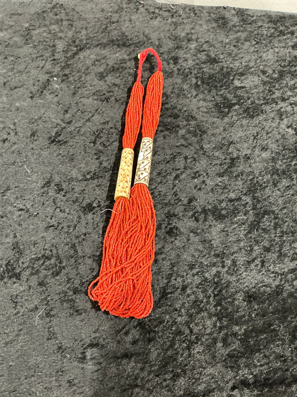 Lot 365: Naga Style Multi-Strand Red Seed Bead Necklace with Carved Spacers