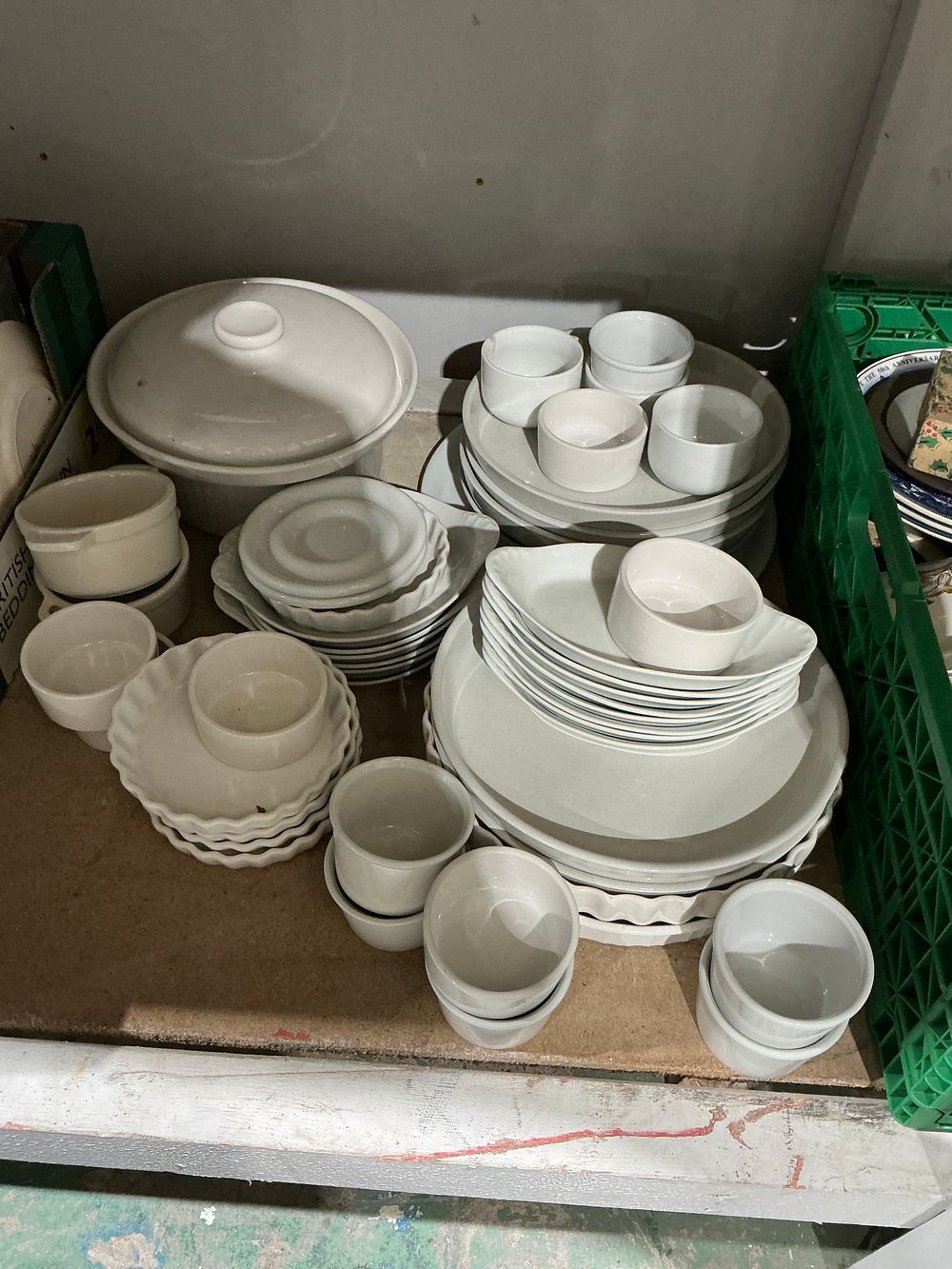 Lot 396: A comprehensive collection of white glazed porcelain culinary dinnerware and ovenware in the French style