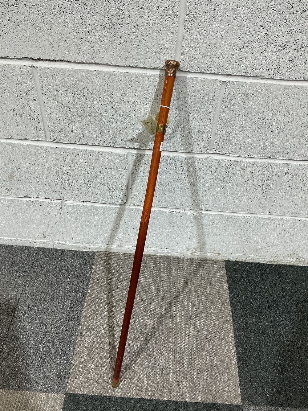 Lot 161: Copper Handle, Malacca Sword Cane, Late 19th/Early 20th Century