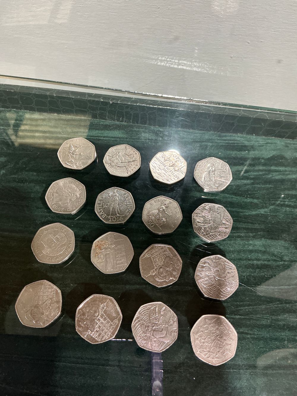 Lot 175: UK 1973-2016 A Collection of 50 Pence Coins, Cupro-Nickel