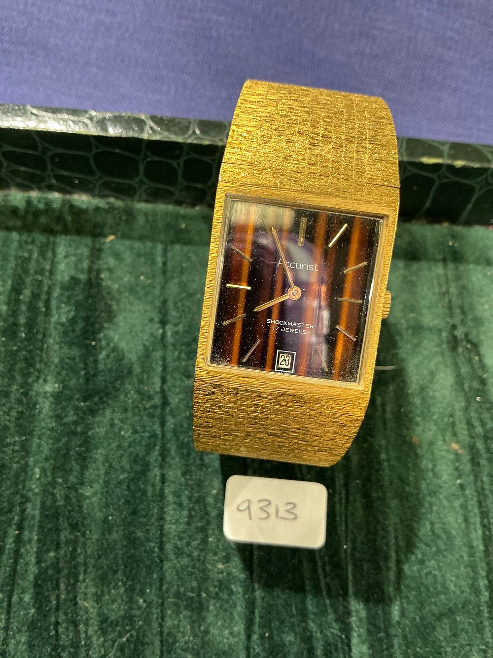 Lot 274: Accurist Shockmaster, a vintage gold-toned dress watch with tiger's eye effect dial