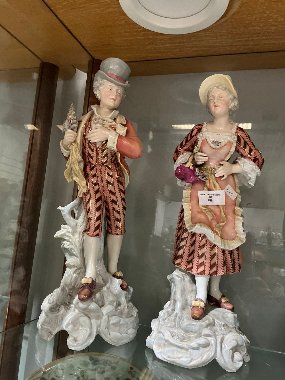 Lot 288: A Pair of Continental Porcelain Capodimonte Style Figurines