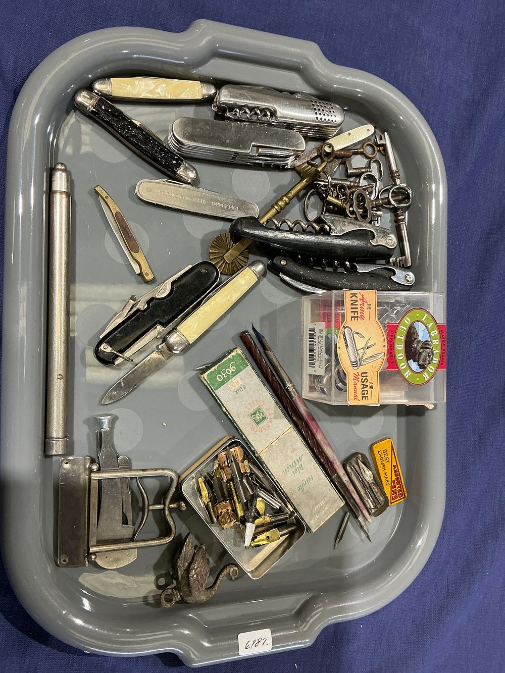 Lot 317: Collection of Vintage Ephemera, Writing Instruments, and Pocket Knives, 20th Century