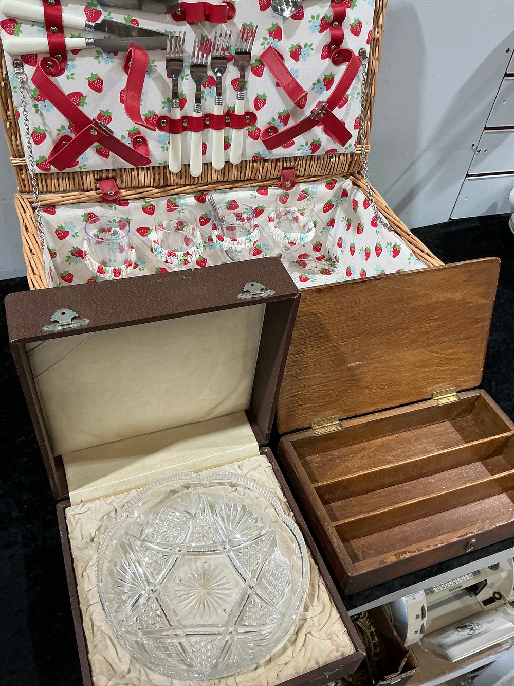 Lot 390: A Mixed Collection of Household Items Including a Wicker Picnic Hamper, a Cased Pressed Glass Platter, and a Wooden Storage Box