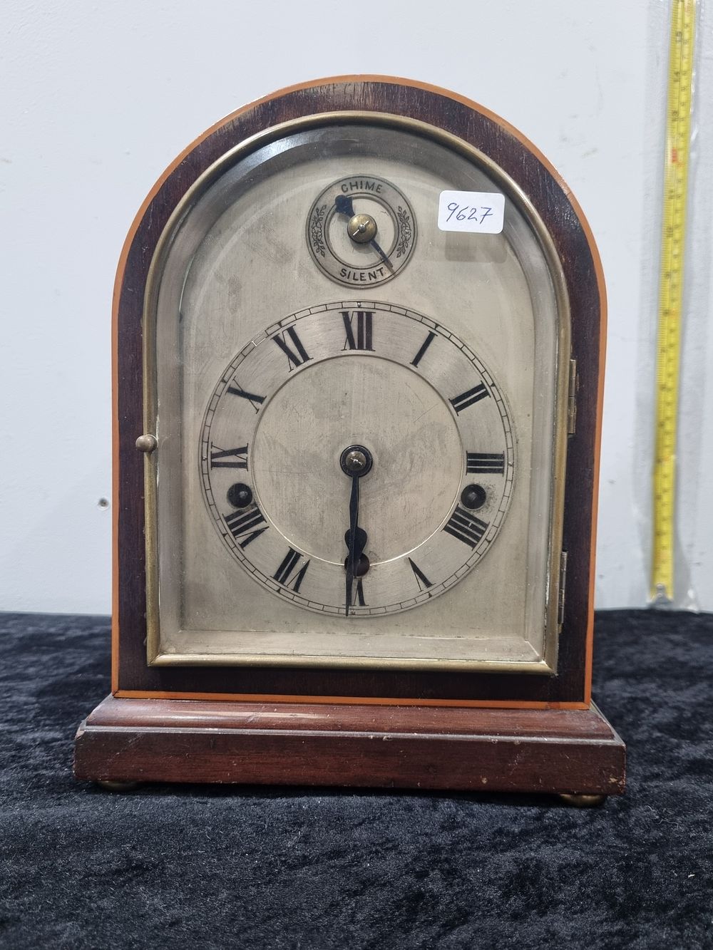 Lot 154: An early 20th-century mahogany and boxwood inlaid mantel clock attributed to Gustav Becker