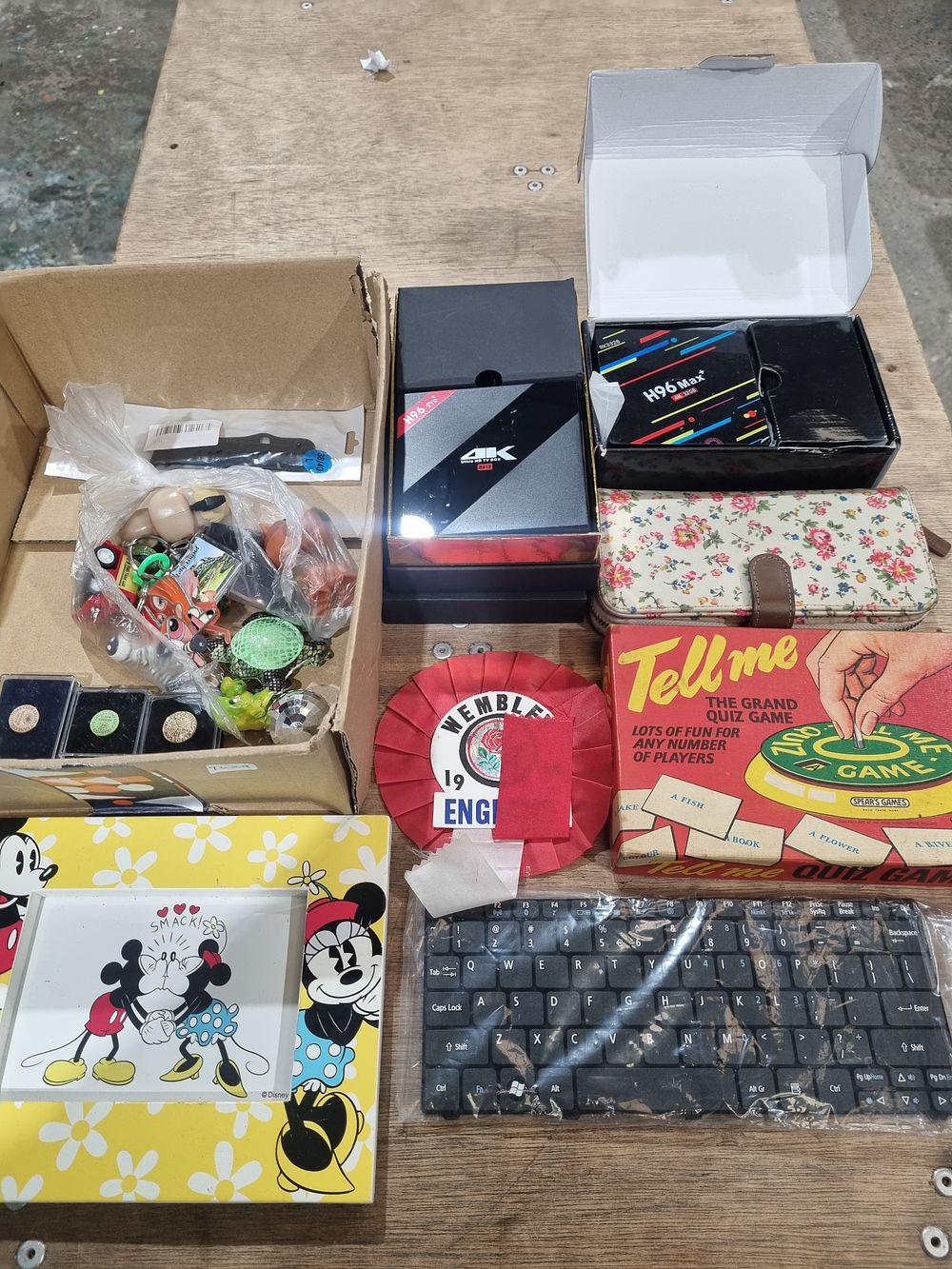 Lot 164: An Assortment of Consumer Electronics, Vintage Games, and Household Sundries