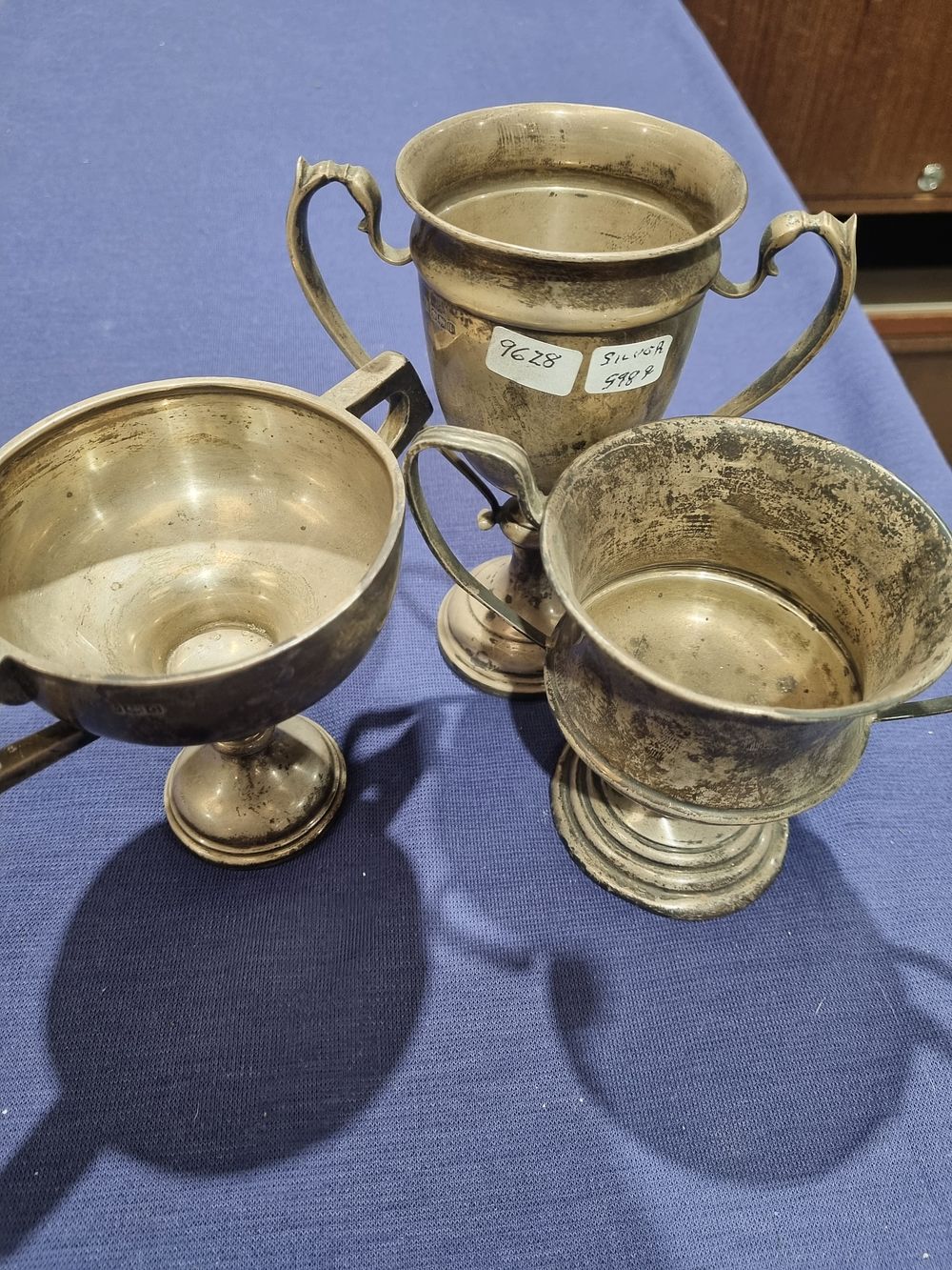 Lot 293: Three George V Sterling Silver Twin-Handled Trophy Cups by Edward Viner