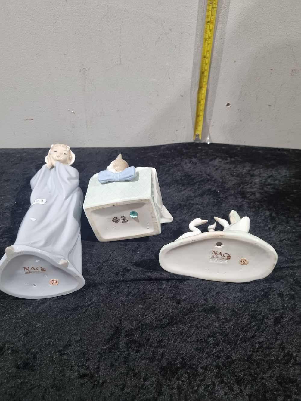 Lot 395: A Trio of Nao by Lladró Glazed Porcelain Figurines