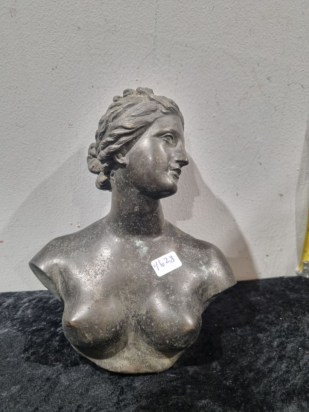 Lot 400: A Patinated Cast Metal Bust of a Female Figure in the Classical Style