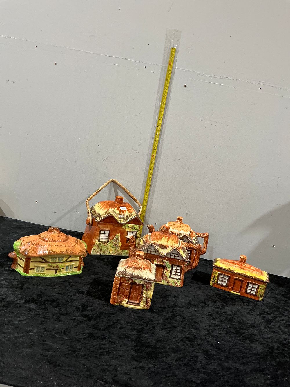Lot 153: A Five-Piece Collection of English Cottage Ware Glazed Earthenware Table Items