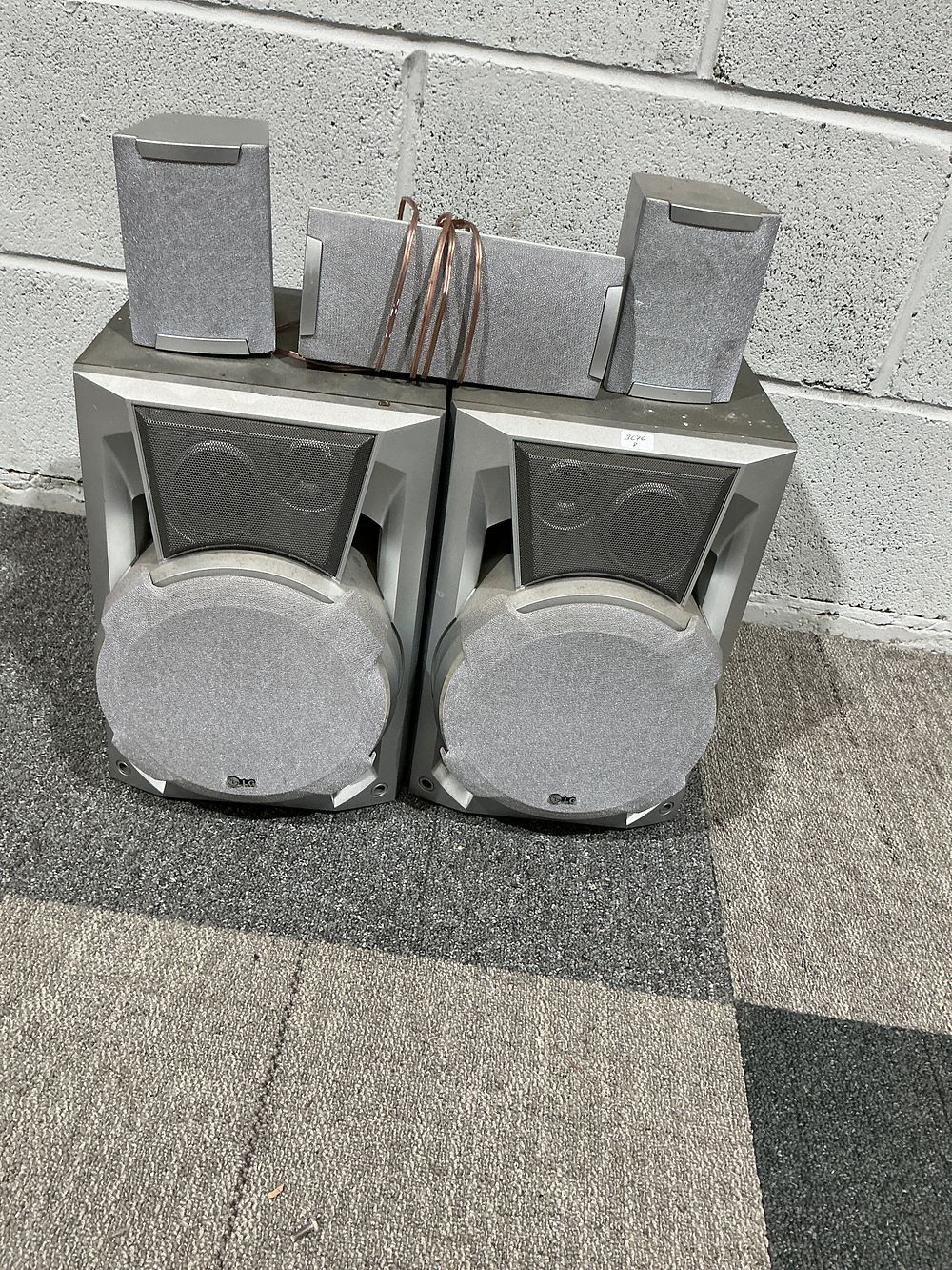 Lot 186: A Set of Five LG Surround Sound Speakers