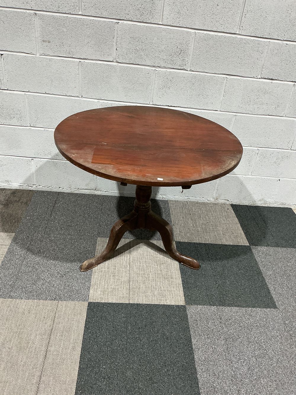Lot 201: A George III style mahogany tripod table