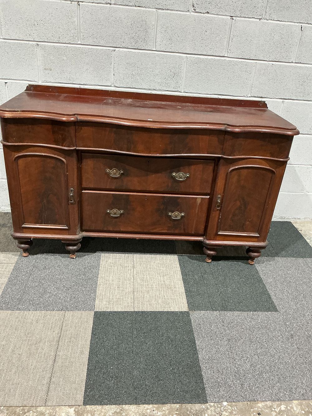 Lot 205: Victorian Style Mahogany Serpentine Sideboard with Flame Mahogany Veneers