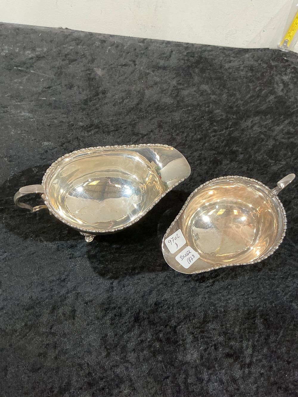 Lot 251: A Pair of Victorian Sterling Silver Sauce Boats by Edward Souter Barnsley and Co Birmingham 1878