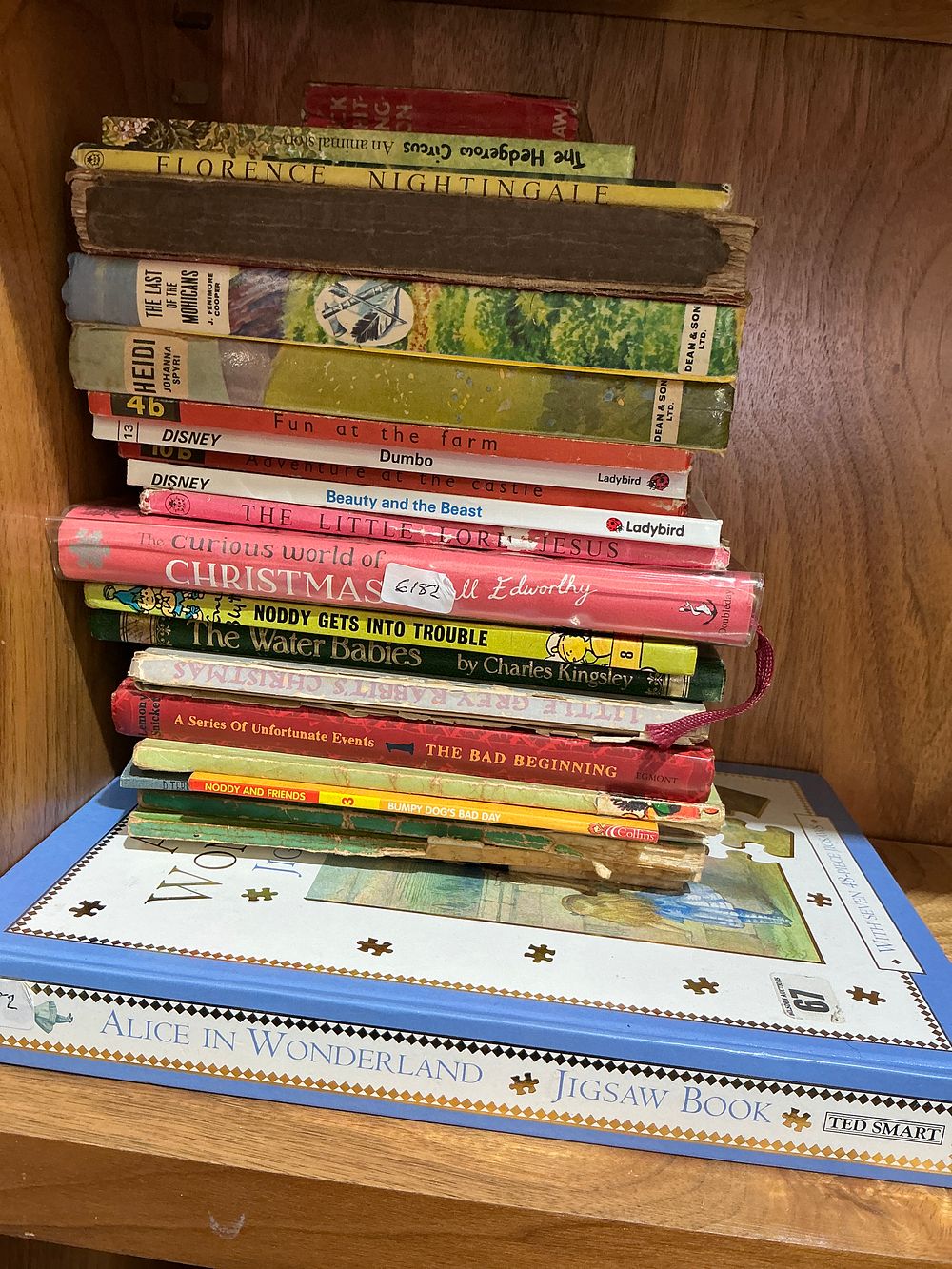Lot 263: A Collection of Approximately 17 Childrens Books and Illustrated Classics Including Alice in Wonderland Jigsaw Book