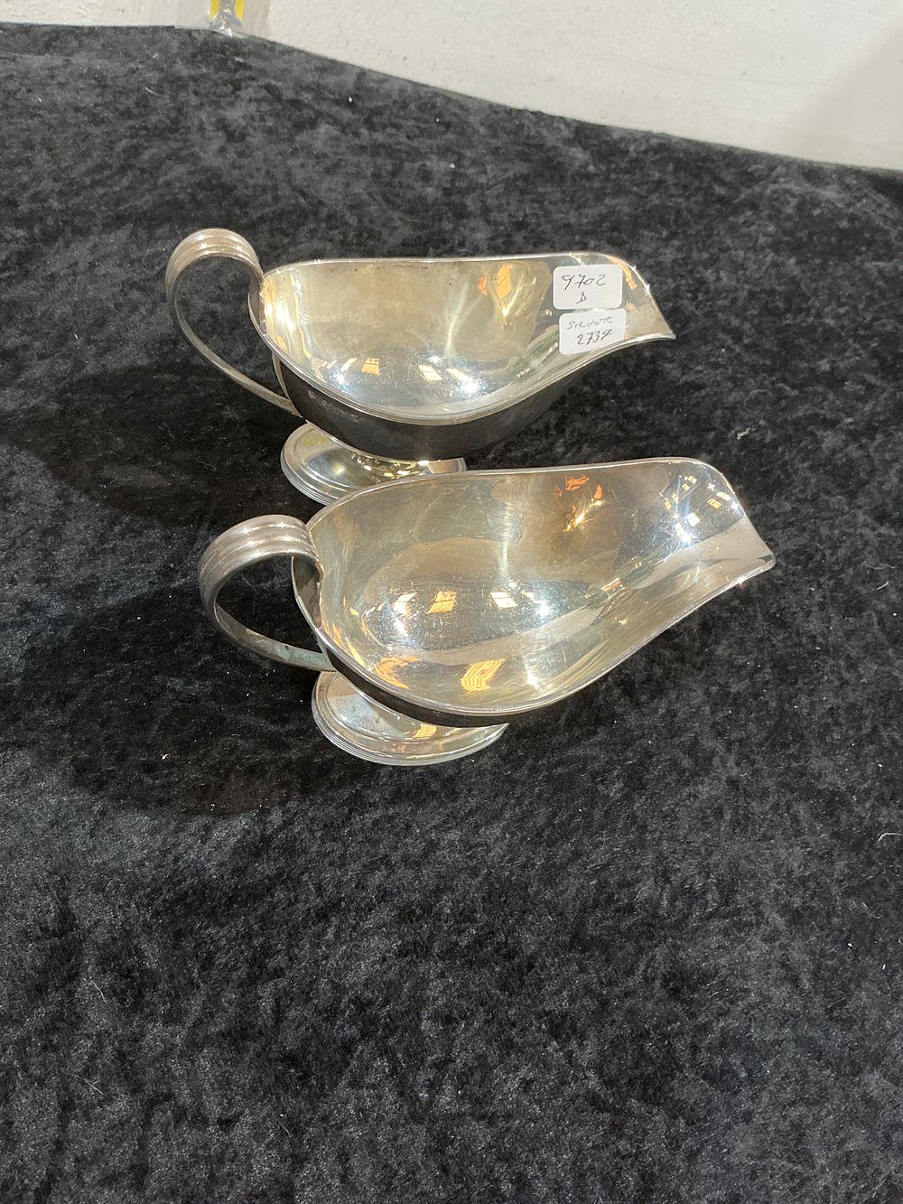 Lot 323: A Pair of George III Style Sterling Silver Sauce Boats, London, 1910