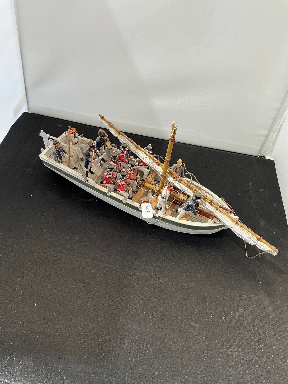 Lot 195: A Napoleonic Era British Landing Party Diorama Featuring a Wooden Whale Boat and Hand-Painted Miniature Figures Metal