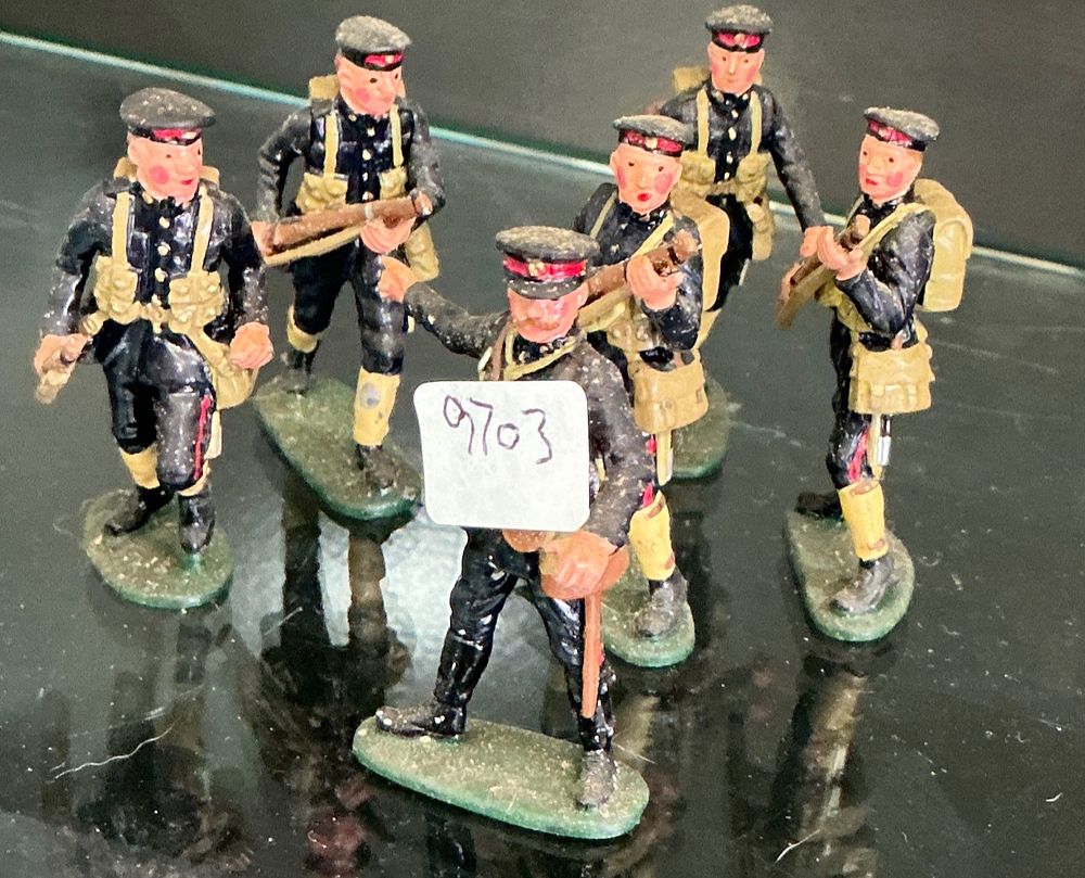 Lot 204: A Set of Six Vintage Hand-Painted Lead British Infantry Toy Soldiers
