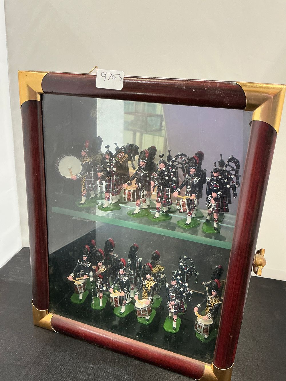 Lot 255: A Collection of W. Britain Hand Painted Metal Toy Soldiers Scottish Highland Pipe and Drum Band