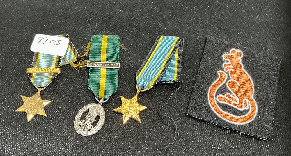 Lot 307: An Assortment of British Second World War Medals and Insignia including Air Crew Europe Star and 7th Armoured Division Formation Sign