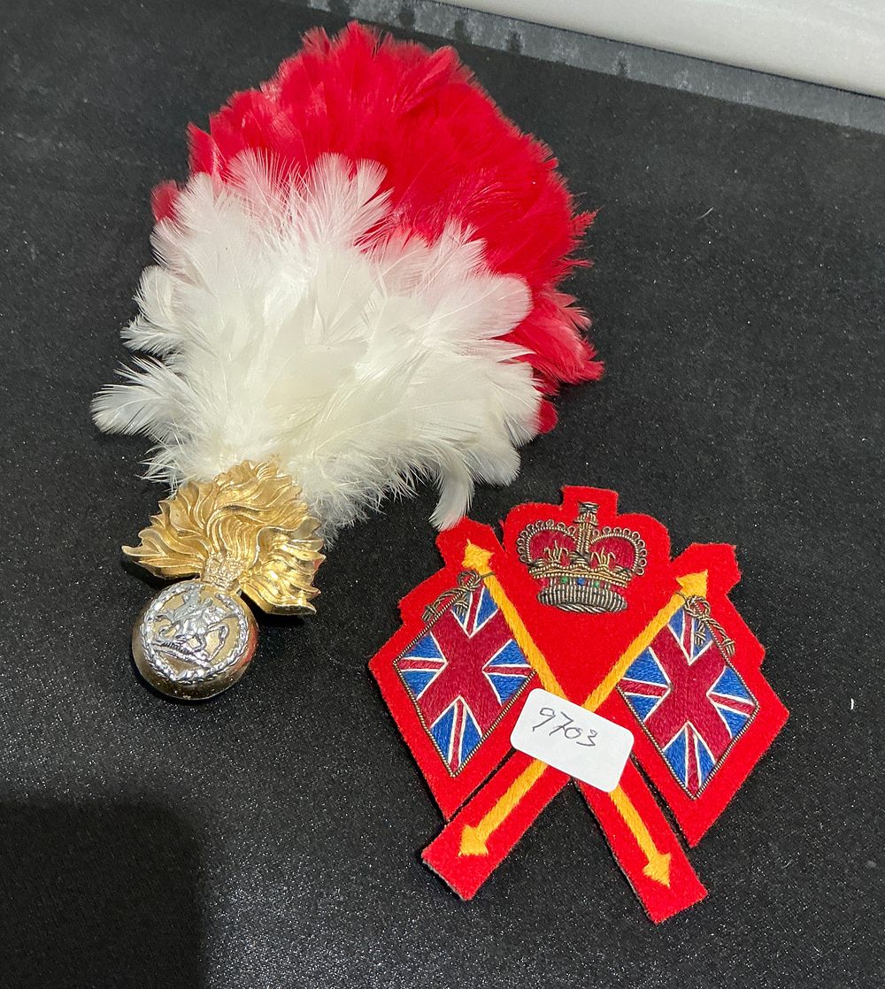 Lot 317: Two Items of British Army Insignia Comprising a Royal Regiment of Fusiliers Cap Badge with Hackle and a Drum Major Appointment Badge