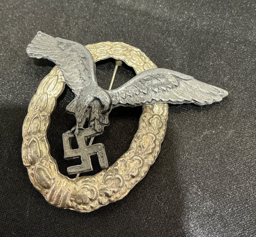 Lot 347: A Second World War Luftwaffe Pilot Badge by C.E. Juncker
