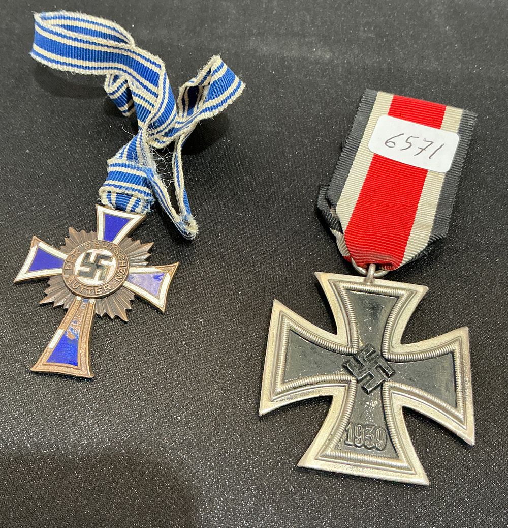 Lot 380: Two Third Reich Awards comprising a 1939 Iron Cross 2nd Class and a Bronze Cross of Honour of the German Mother replicas