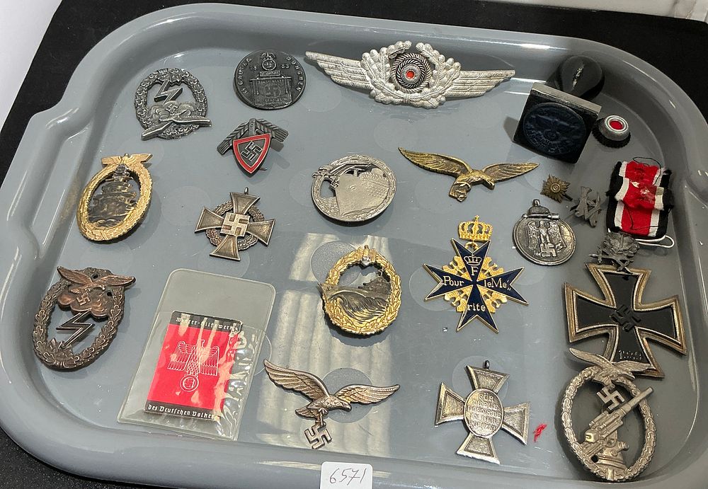 Lot 383: A Collection of Third Reich Military and Political Insignia, Medals, and Badges replicas
