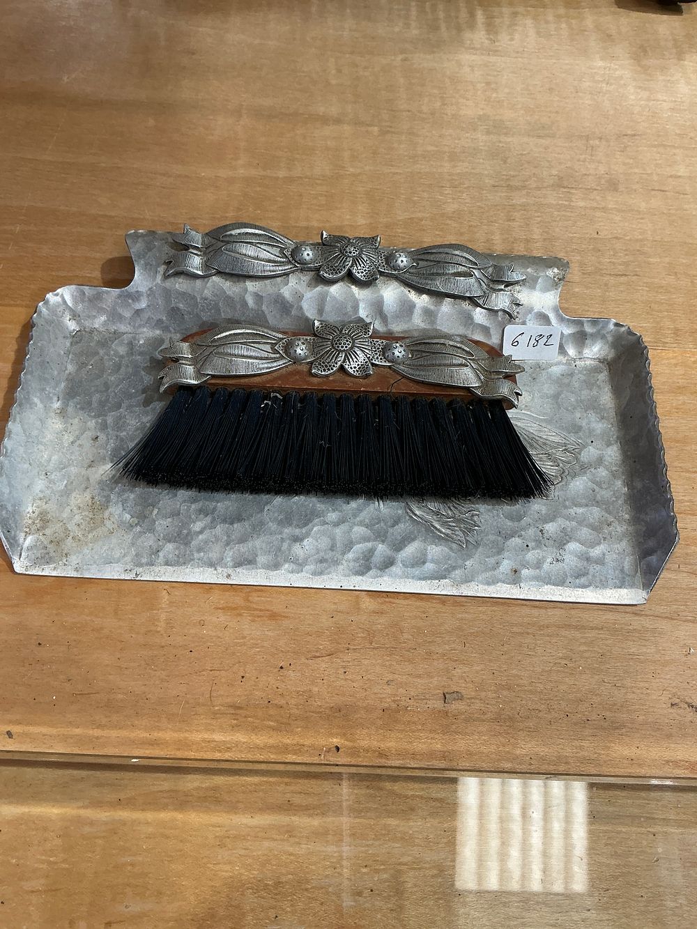 Lot 187: An Arts and Crafts Style Hammered White Metal Table Crumb Set