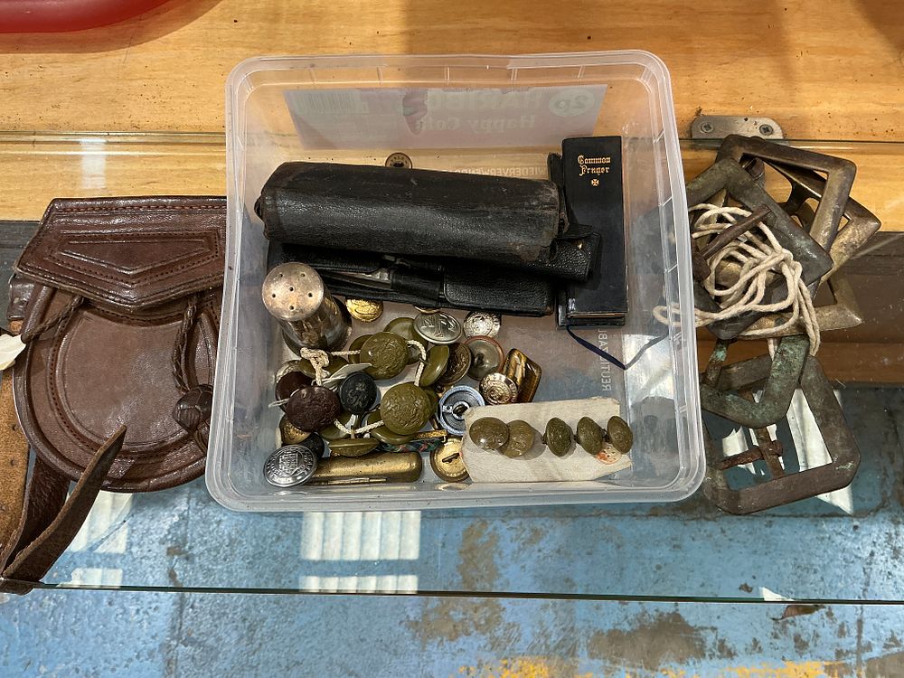 Lot 189: A Collection of British Military Personal Effects, Buttons, and Equipment