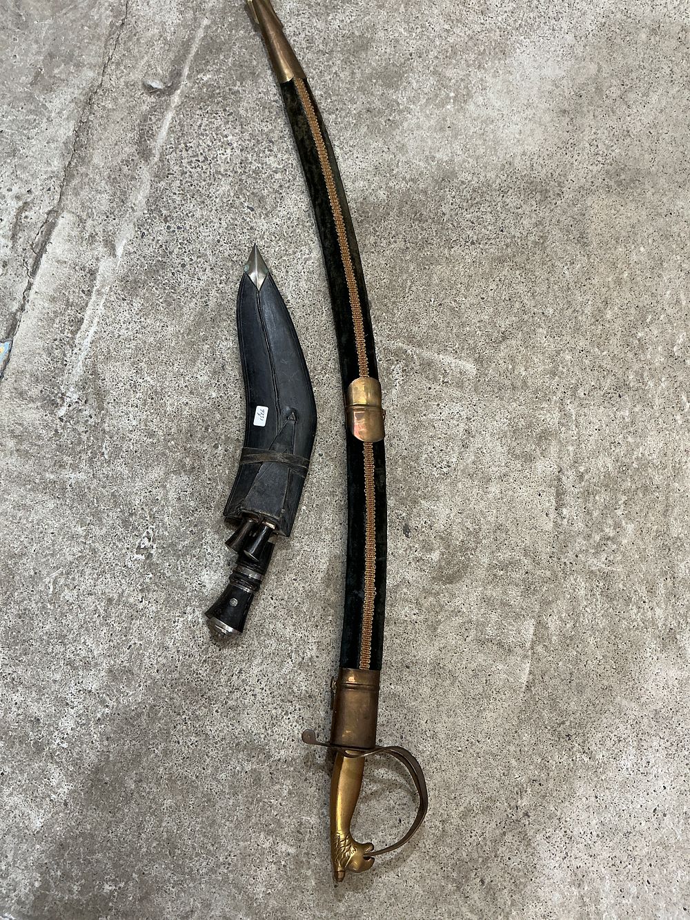 Lot 193: Two Edged Weapons Comprising a Military Style Sabre and a Nepalese Kukri