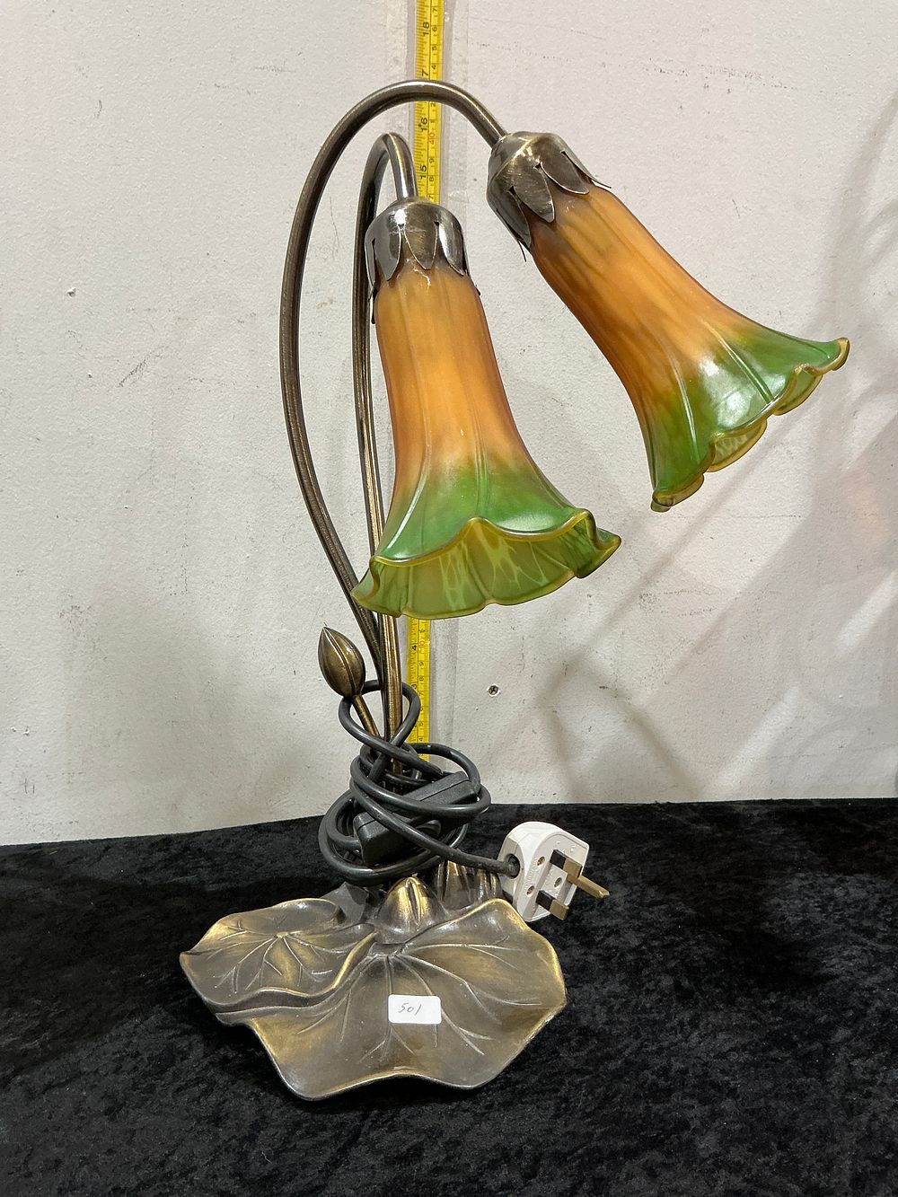 Lot 269: A Twin-Light Art Nouveau Style Lily Table Lamp in the Style of Tiffany