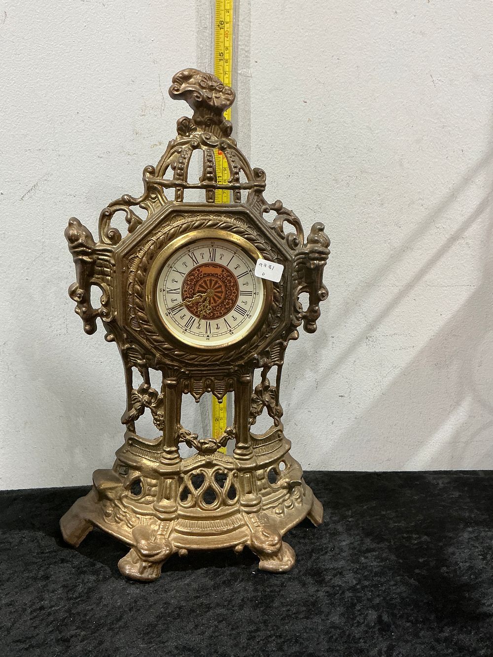 Lot 285: A Rococo Revival Style Cast Metal Mantel Clock