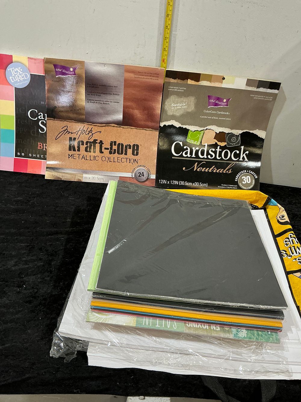 Lot 188: A Collection of Assorted Cardstock and Paper Crafting Supplies including Core'dinations and Tim Holtz