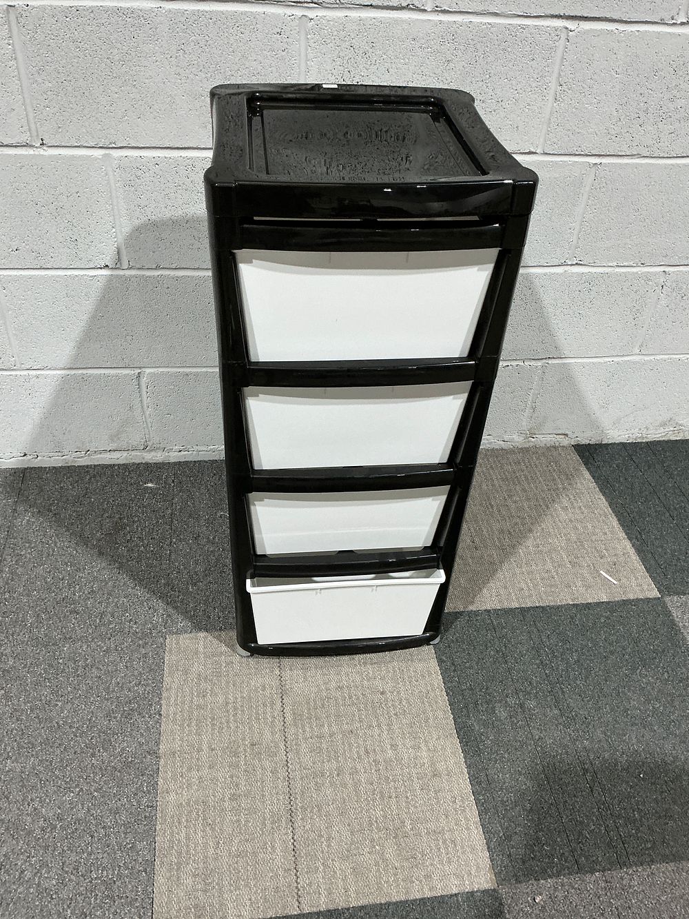 Lot 211: A contemporary five drawer plastic storage unit