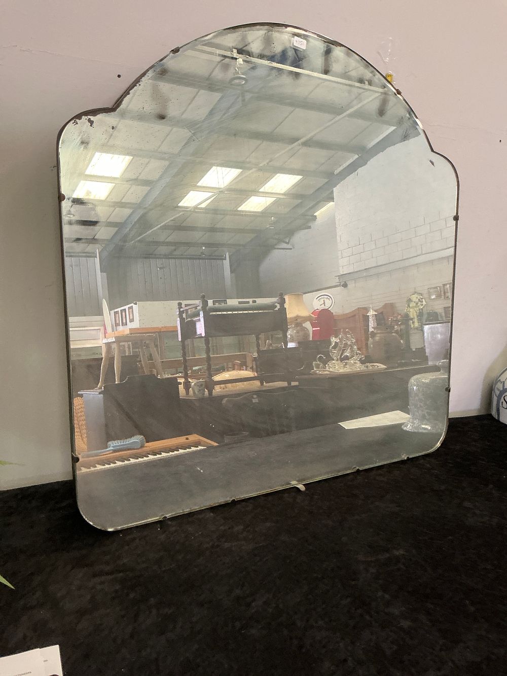 Lot 155: An Art Deco Style Frameless Cloud Top Wall Mirror