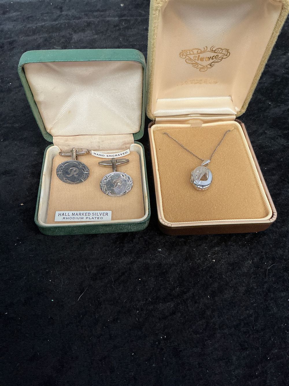 Lot 187: TWO ITEMS OF VINTAGE ENGRAVED SILVER JEWELLERY COMPRISING A CLEWCO LOCKET PENDANT AND A PAIR OF CUFFLINKS