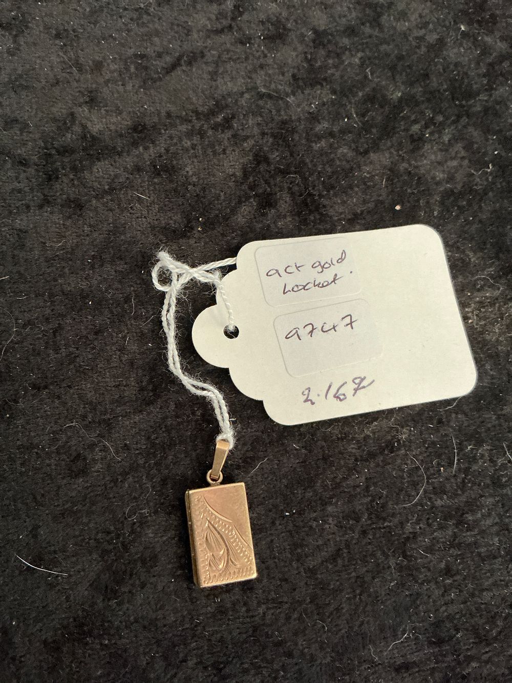 Lot 216: A Victorian 9ct Gold Engraved Book Locket