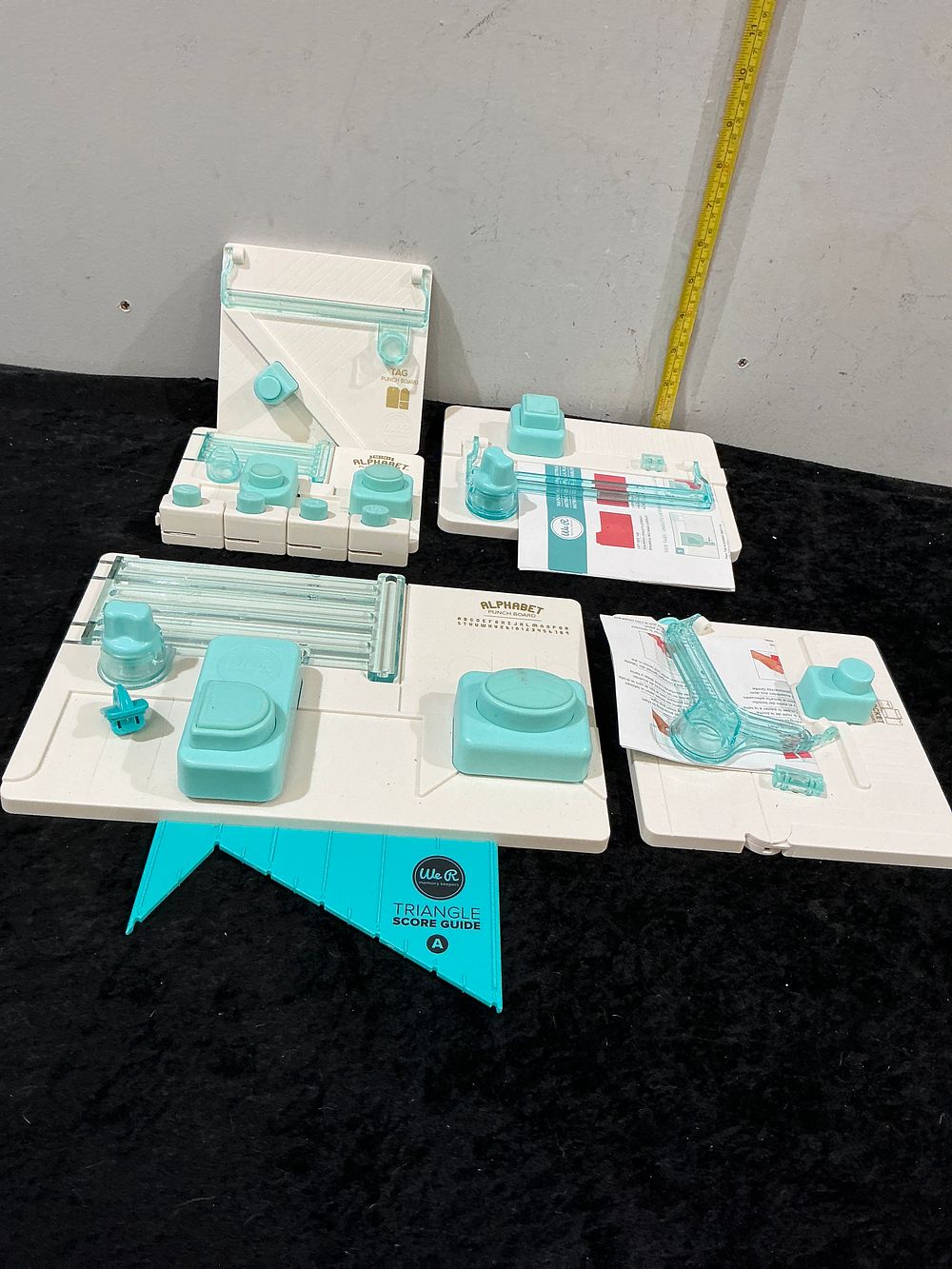 Lot 173: A Collection of We R Memory Keepers Papercrafting Punch Boards and Guides