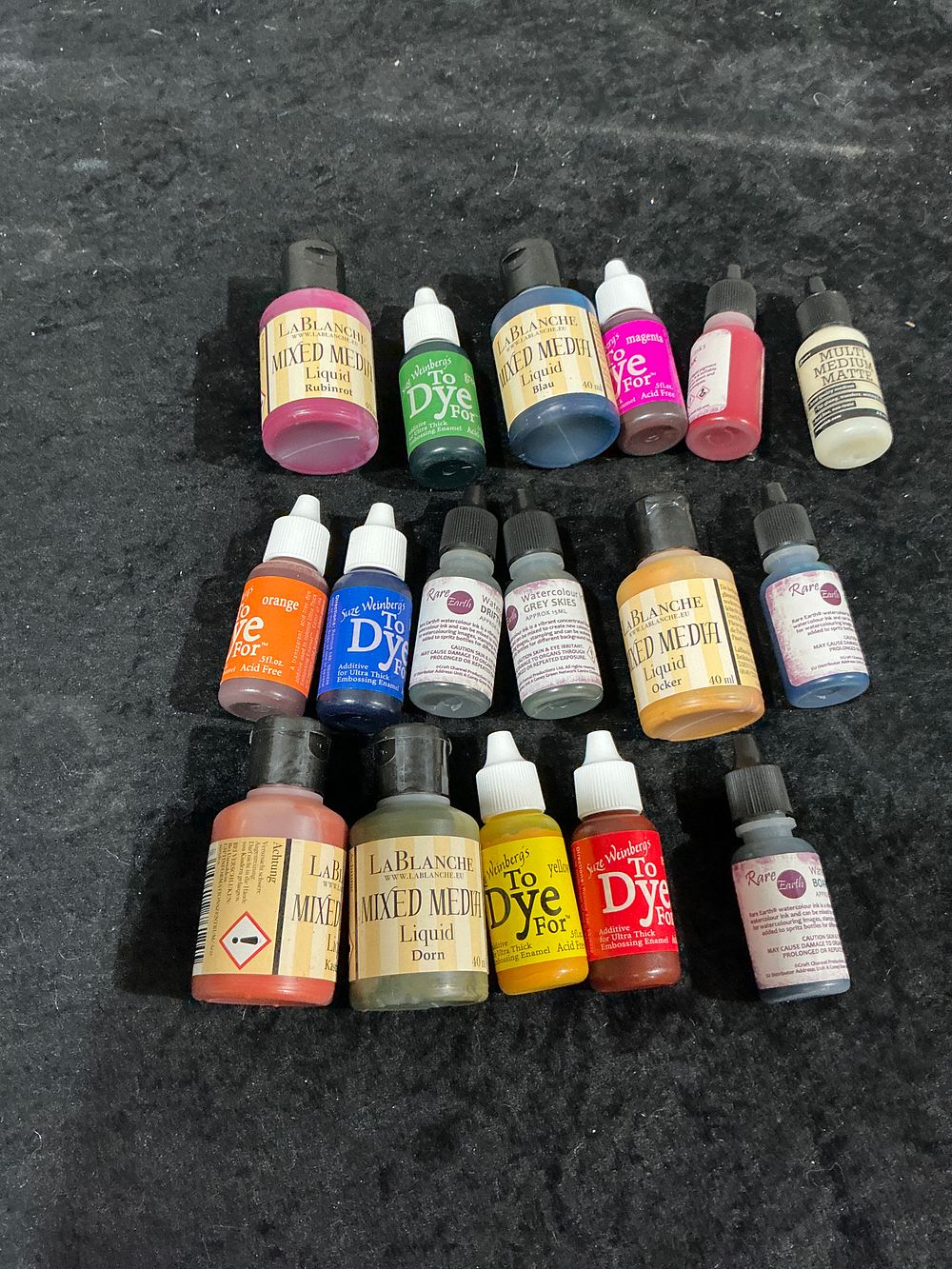 Lot 187: A Collection of Assorted Craft Inks Dyes and Mixed Media Liquids by LaBlanche Sue Weinberg and Rare Earth