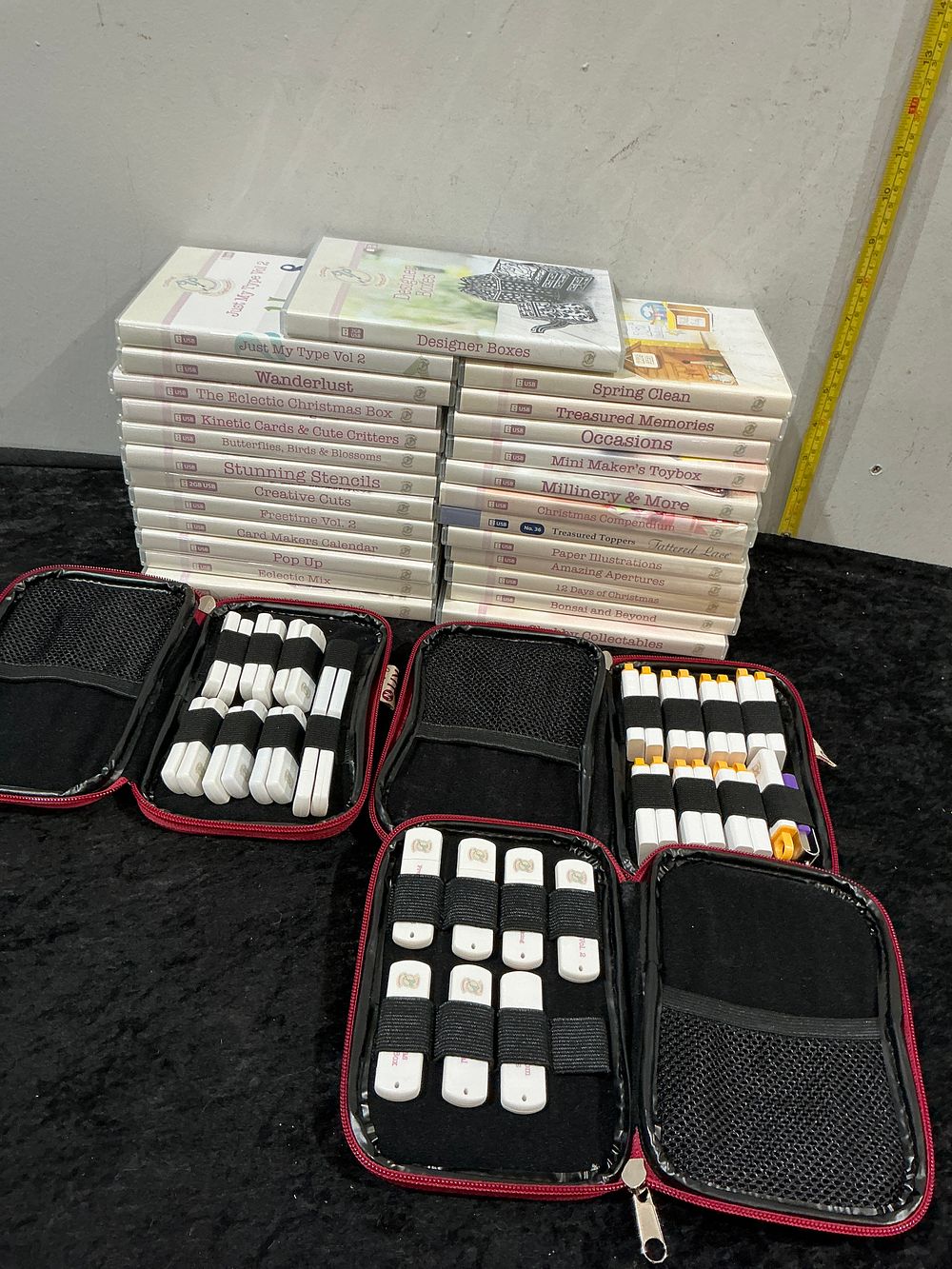 Lot 204: A Collection of Tattered Lace Digital Crafting USB Sticks and Storage Cases