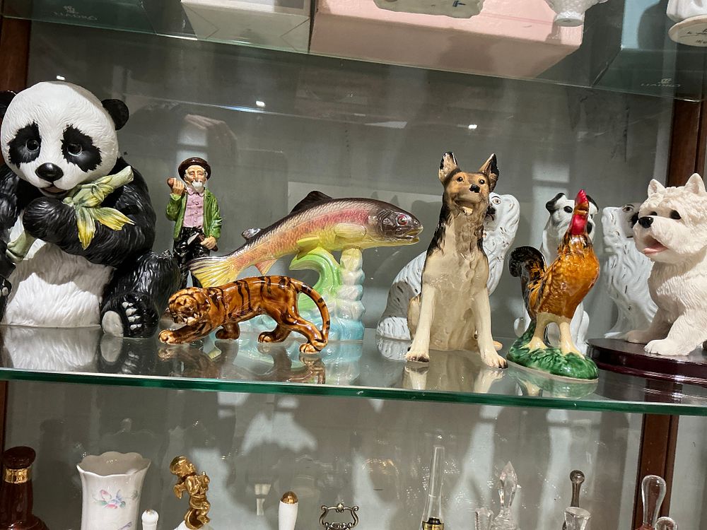 Lot 277: An Assortment of Porcelain and Ceramic Animal and Character Figurines